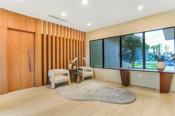 a bedroom with a bed and a ceiling fan