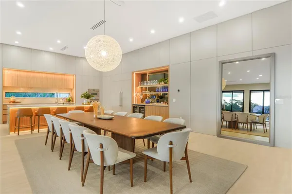 a bathroom with a granite countertop sink and a bathtub