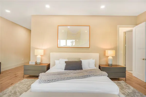 a view of a hallway with paintings on the wall