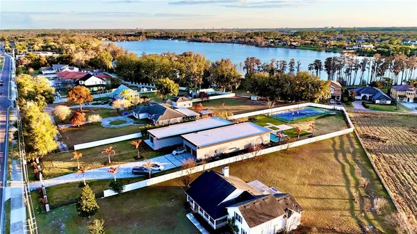 a aerial view of a house with swimming pool