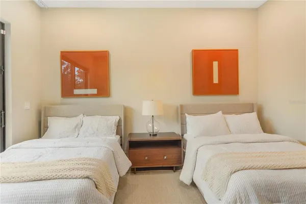 a kitchen with cabinets and stainless steel appliances