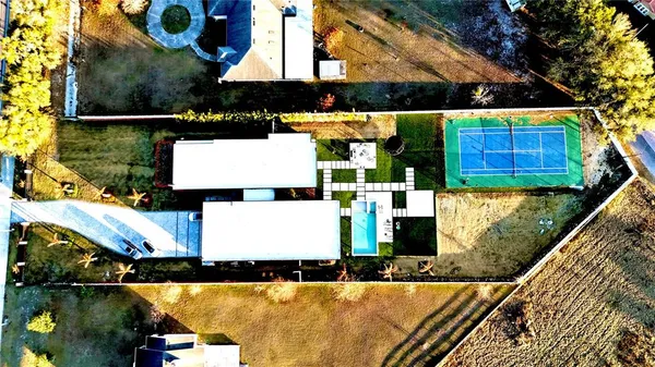 a view of a swimming pool with lounge chair