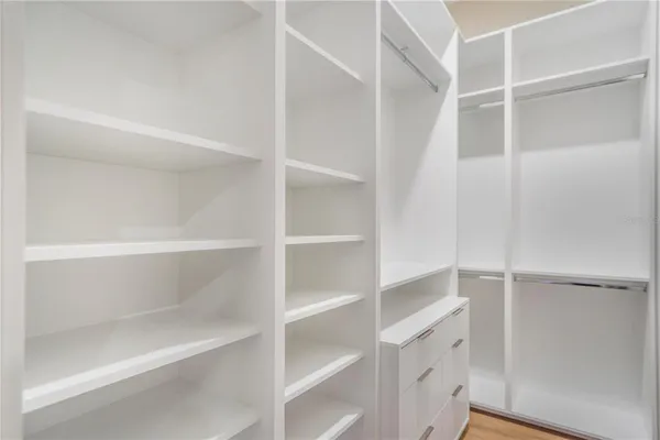 a view of a yard with an house and sitting space