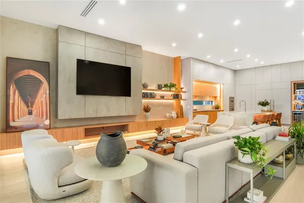 a view of a living room with a large window