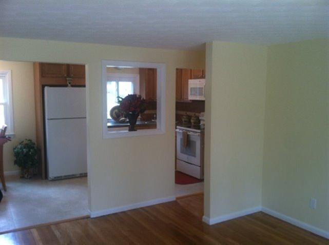 9 Alden Road Wareham, MA 02571 - Photo 3 of 22 a view of a kitchen from the hallway