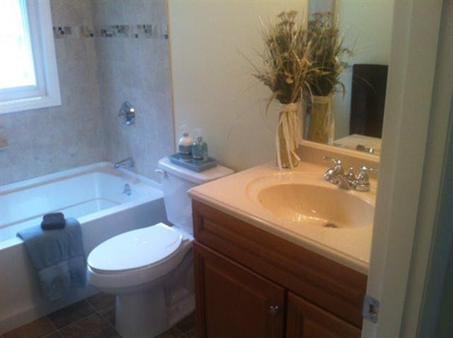 9 Alden Road Wareham, MA 02571 - Photo 6 of 22 a bathroom with a sink toilet and shower