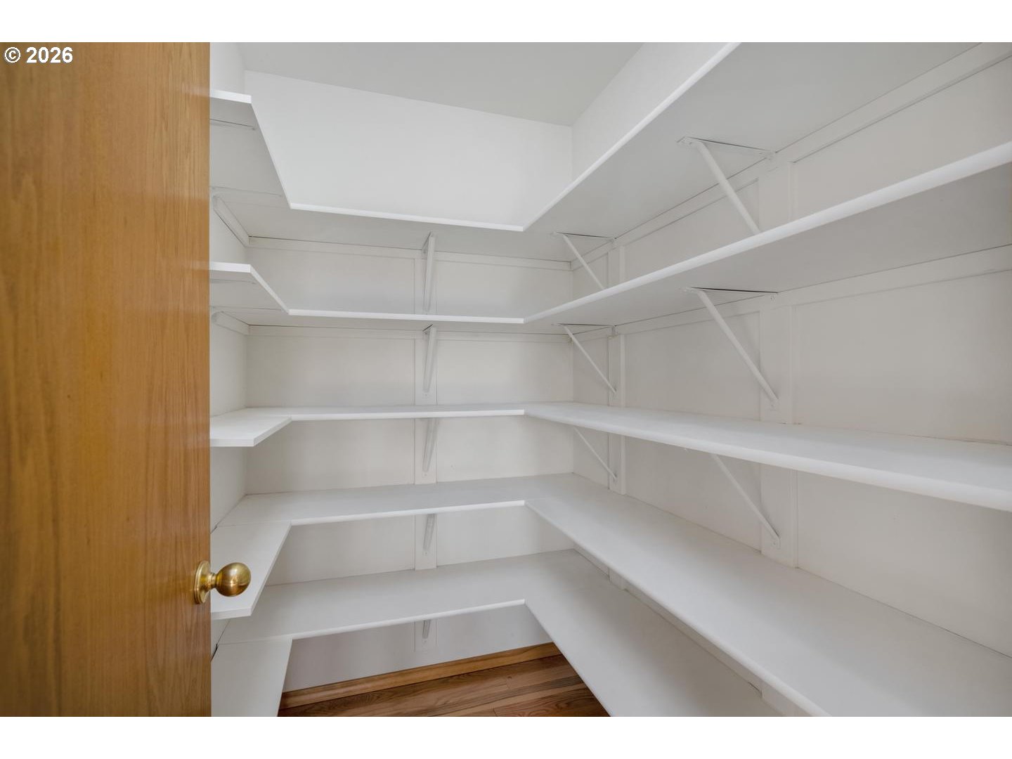 52364 Northeast 14th Scappoose, OR 97056 - Photo 20 of 42 a view of walk in closet with empty racks