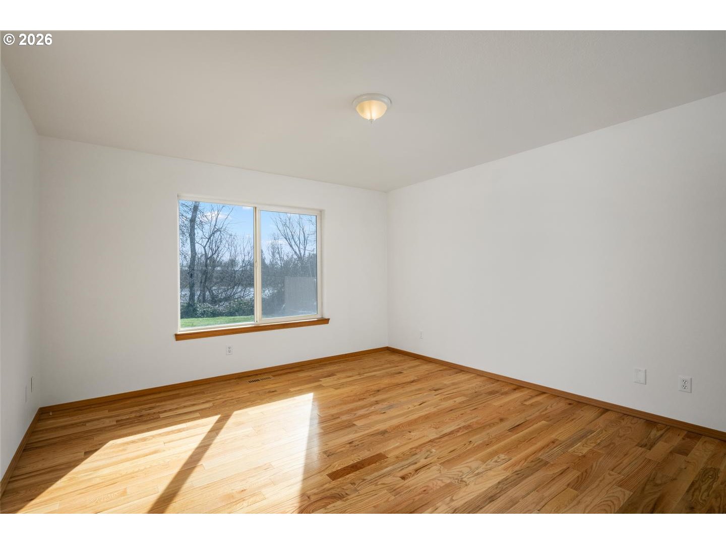 52364 Northeast 14th Scappoose, OR 97056 - Photo 25 of 42 a view of an empty room with a window