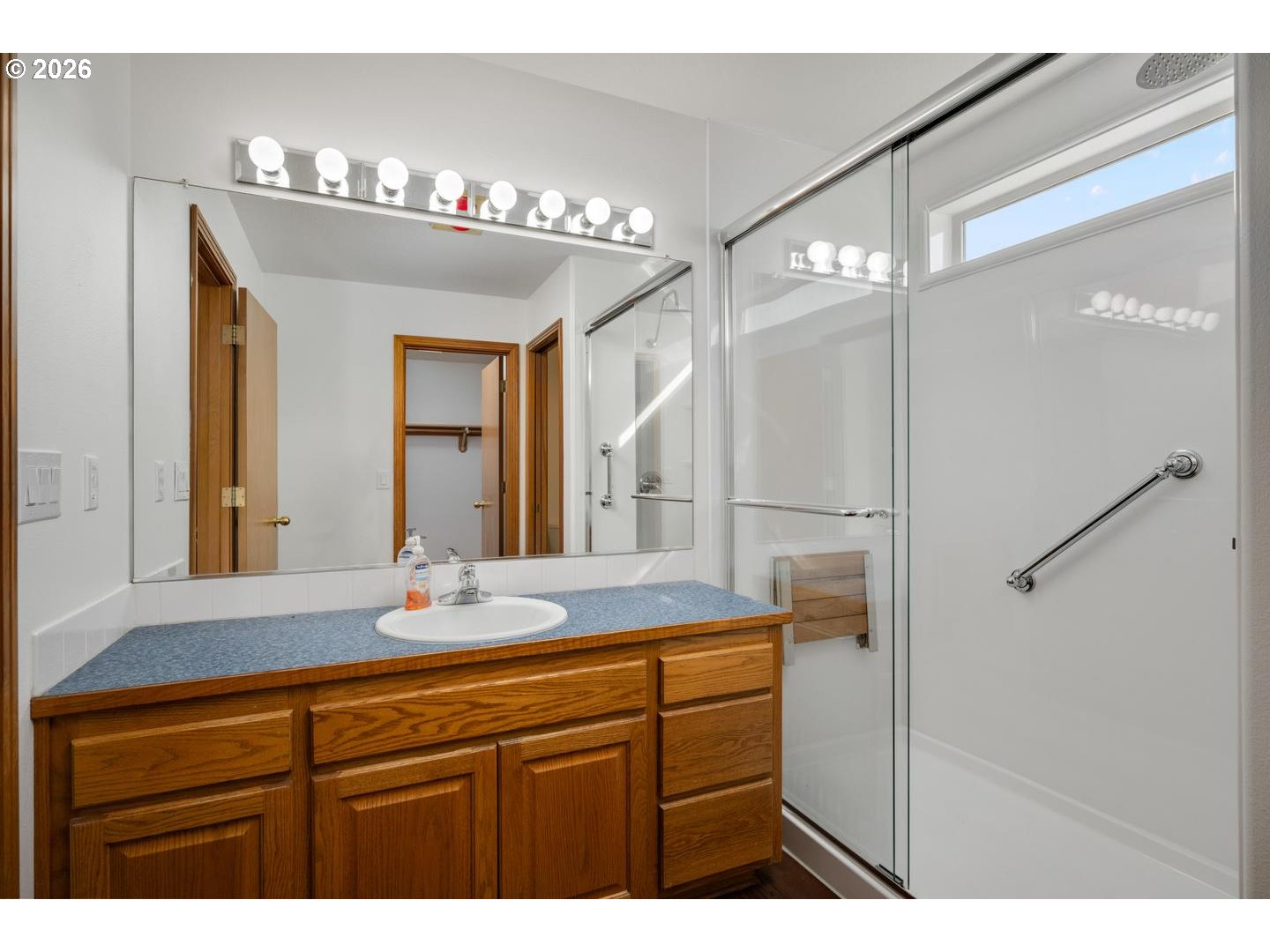 52364 Northeast 14th Scappoose, OR 97056 - Photo 28 of 42 a bathroom with a sink vanity and a mirror