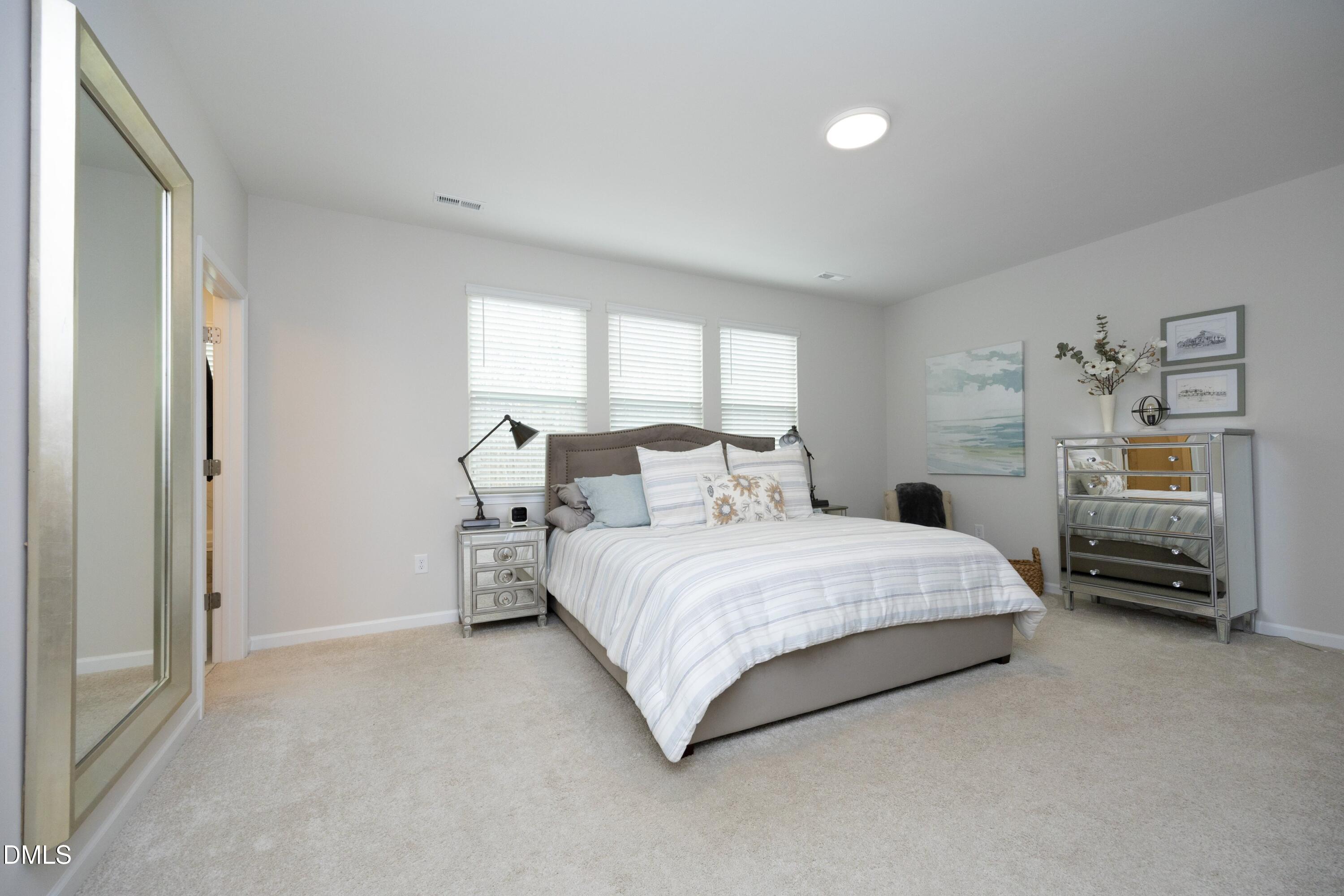 7707 Litcham Drive Raleigh, NC 27615 - Photo 20 of 38 24PrimaryBedroom