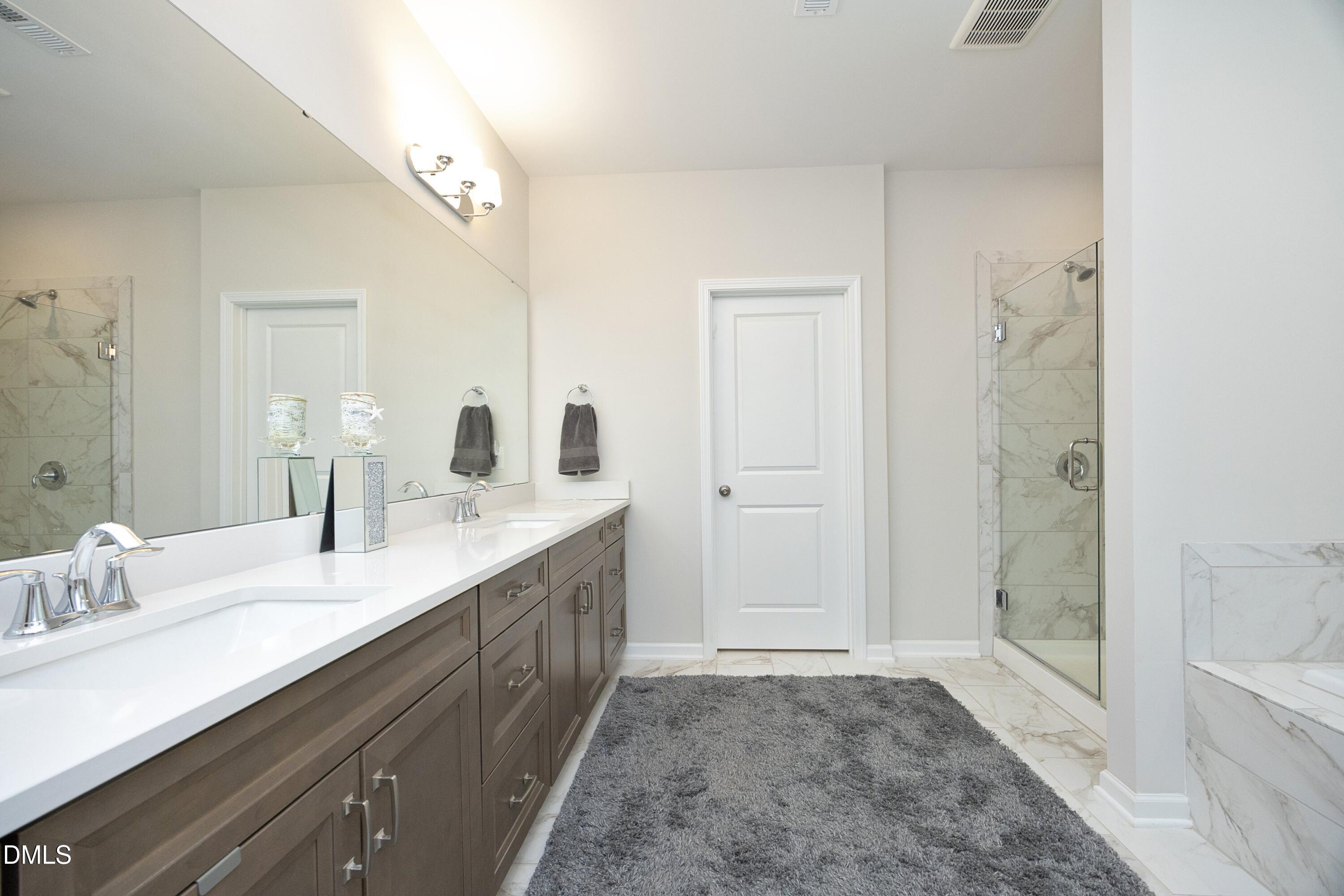 7707 Litcham Drive Raleigh, NC 27615 - Photo 21 of 38 25PrimaryBath