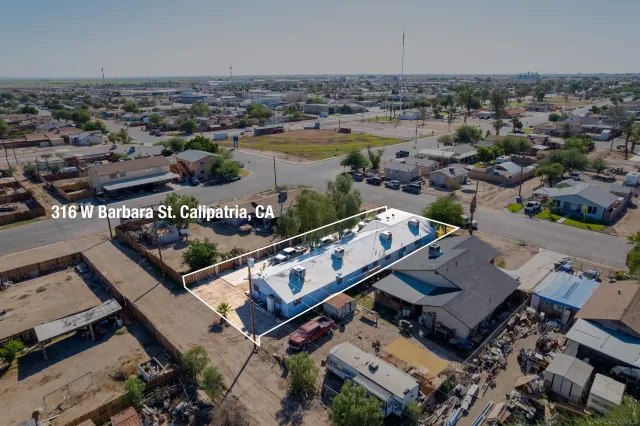 an aerial view of a city with houses