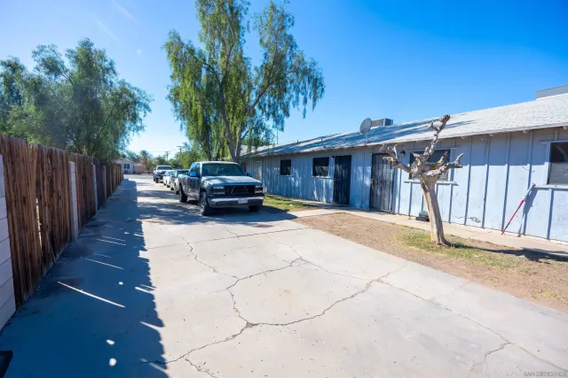 a house view with a backyard space