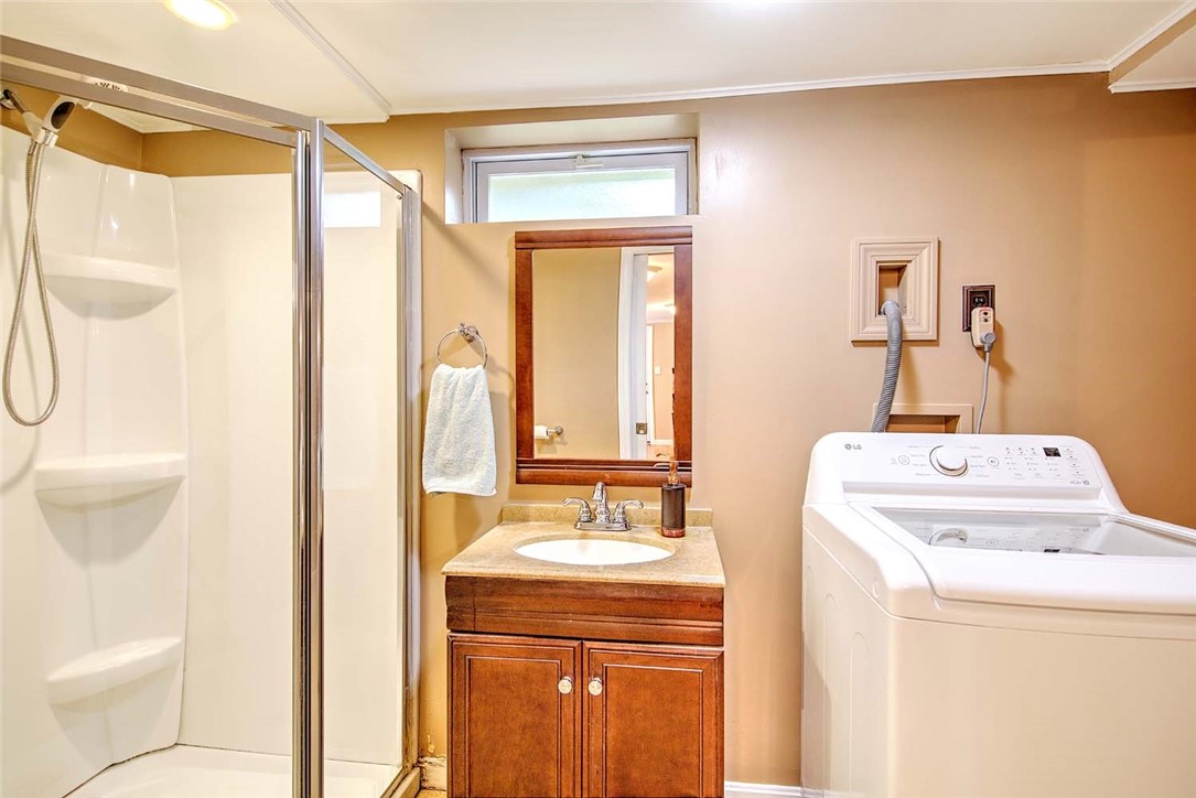 98 Iroquois Road Cumberland, RI 02864 - Photo 36 of 45 Bathroom and laundry room in the lower level
