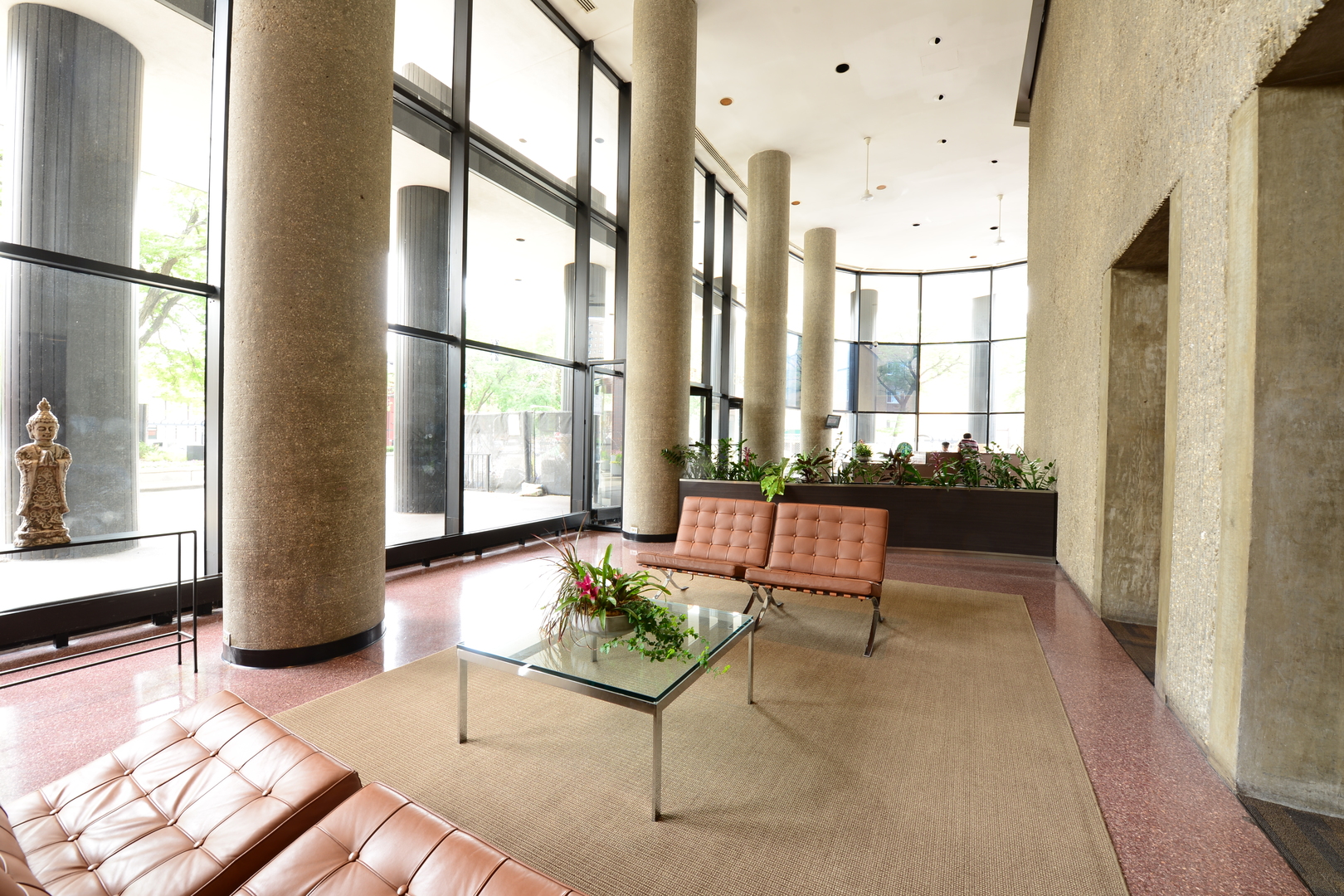 5415 North Sheridan Road, Unit 806 Chicago, IL 60640 - Photo 14 of 16 a view of a entryway with furniture and floor to ceiling window