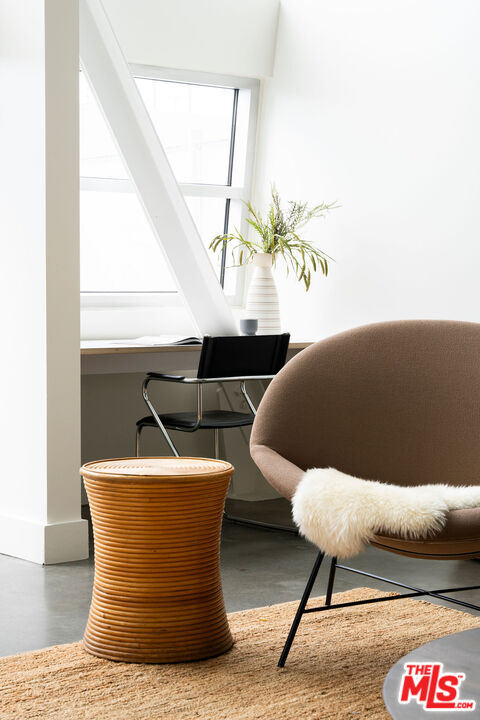 615 Hampton Drive, Unit A101 Venice, CA 90291 - Photo 5 of 24 a blue and white photo of a living room