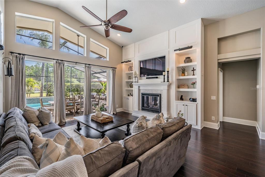 2730 Manning Drive Trinity, FL 34655 - Photo 12 of 43 a living room with furniture fireplace and flat screen tv