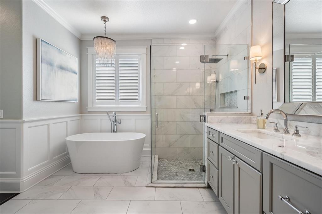 2730 Manning Drive Trinity, FL 34655 - Photo 20 of 43 a spacious bathroom with a sink double vanity and a shower