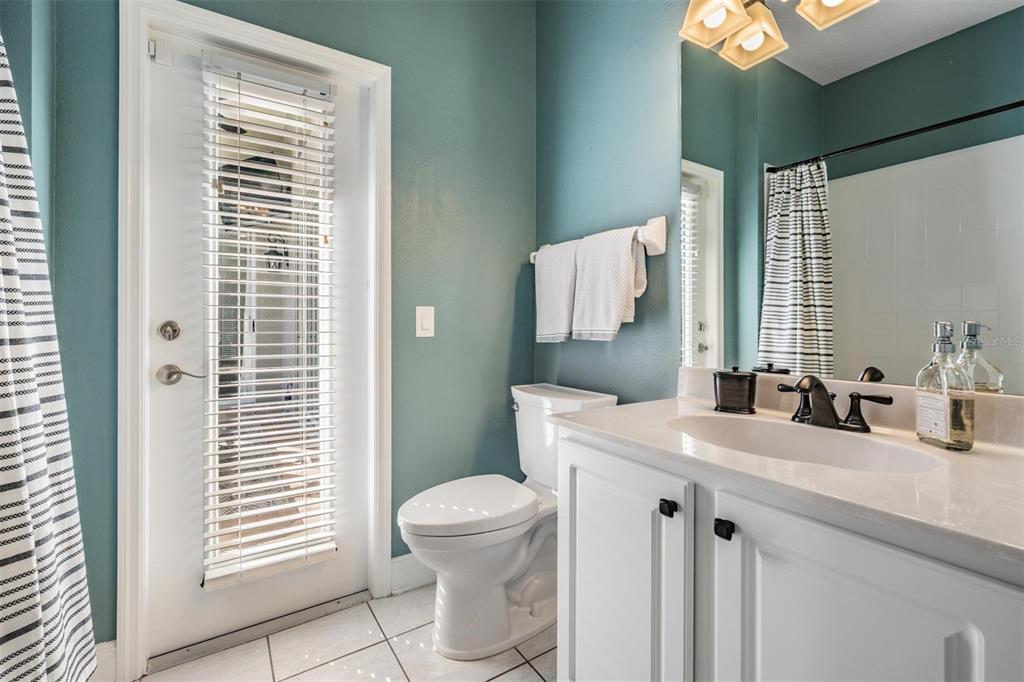 2730 Manning Drive Trinity, FL 34655 - Photo 26 of 43 a bathroom with a sink a toilet and mirror