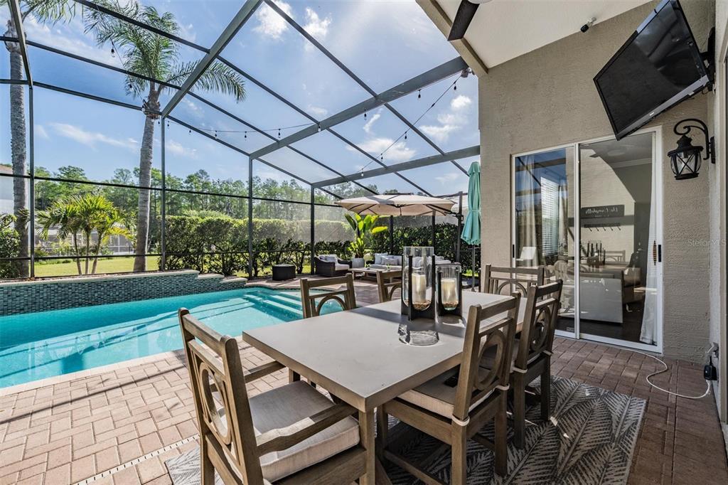 2730 Manning Drive Trinity, FL 34655 - Photo 6 of 43 a view of a patio with a table and chairs