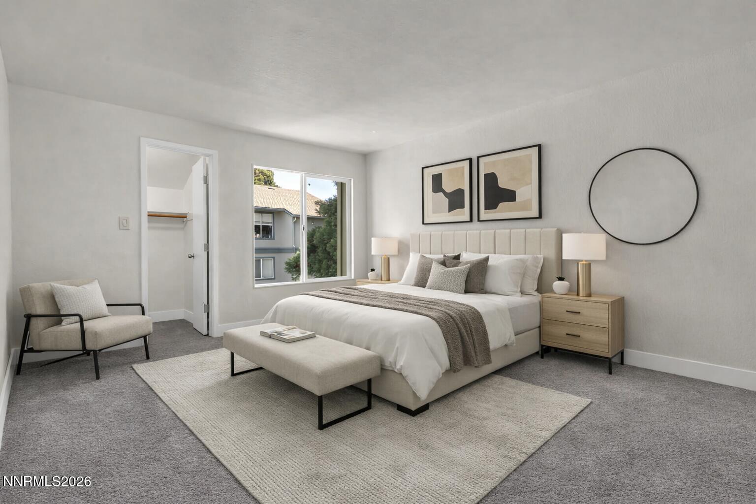 3905 Clear Acre Lane, Unit 26 Reno, NV 89512 - Photo 1 of 27 a spacious bedroom with a bed and window