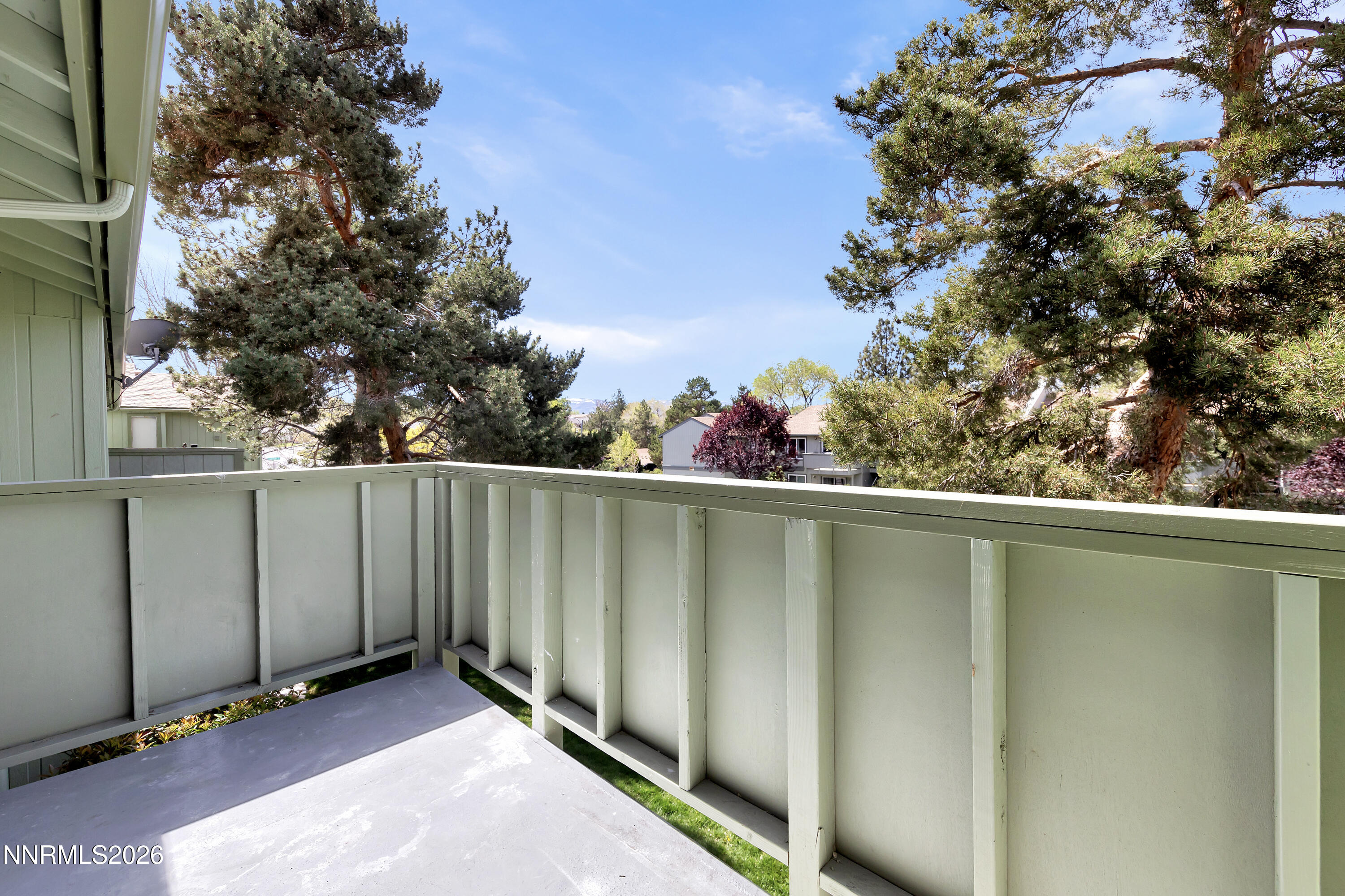 3905 Clear Acre Lane, Unit 26 Reno, NV 89512 - Photo 13 of 27 a view of a balcony with an outdoor space
