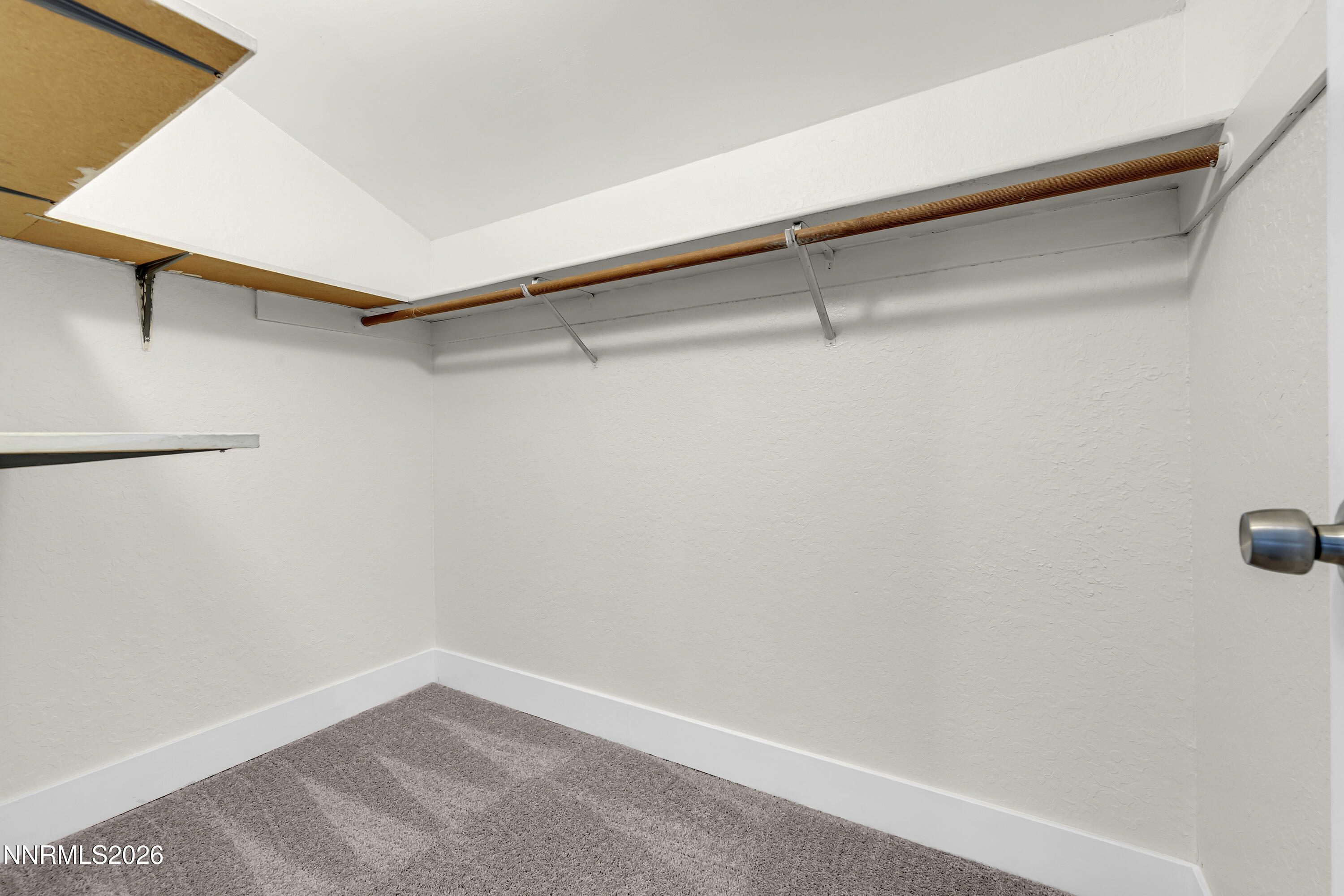 3905 Clear Acre Lane, Unit 26 Reno, NV 89512 - Photo 19 of 27 a view of a room with racks on the wall