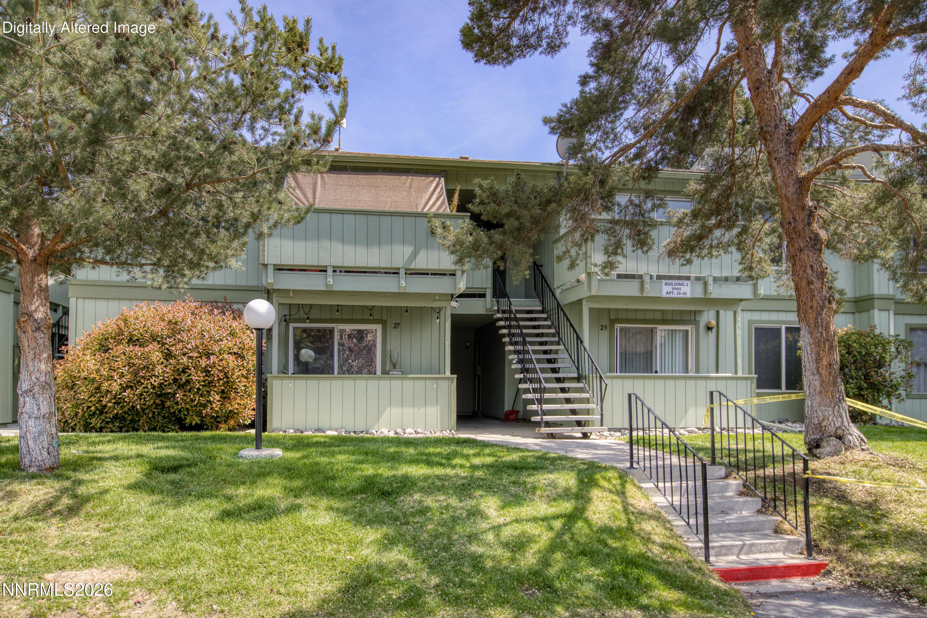 3905 Clear Acre Lane, Unit 26 Reno, NV 89512 - Photo 2 of 27 front view of a house with a yard