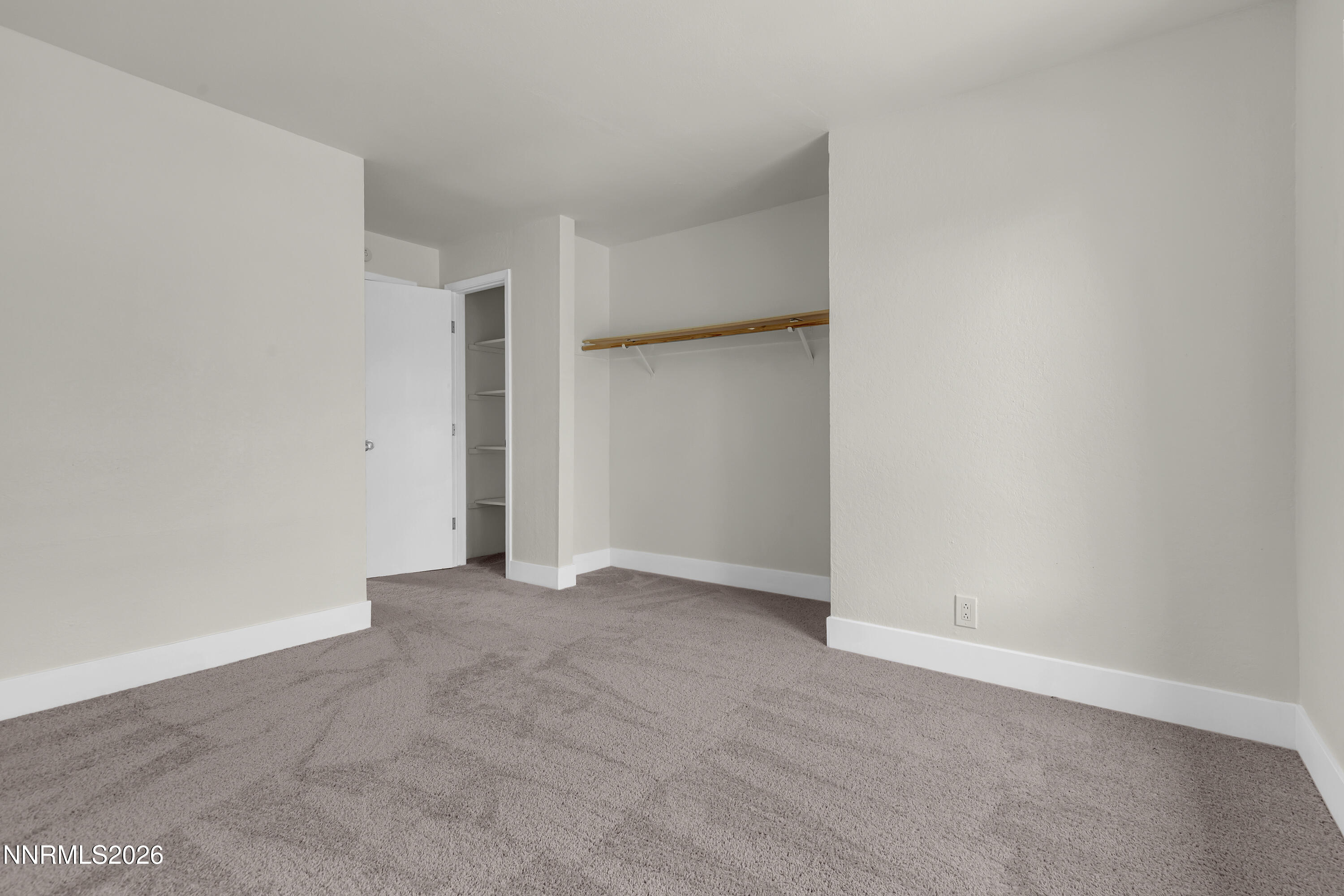 3905 Clear Acre Lane, Unit 26 Reno, NV 89512 - Photo 22 of 27 a view of an empty room with closet