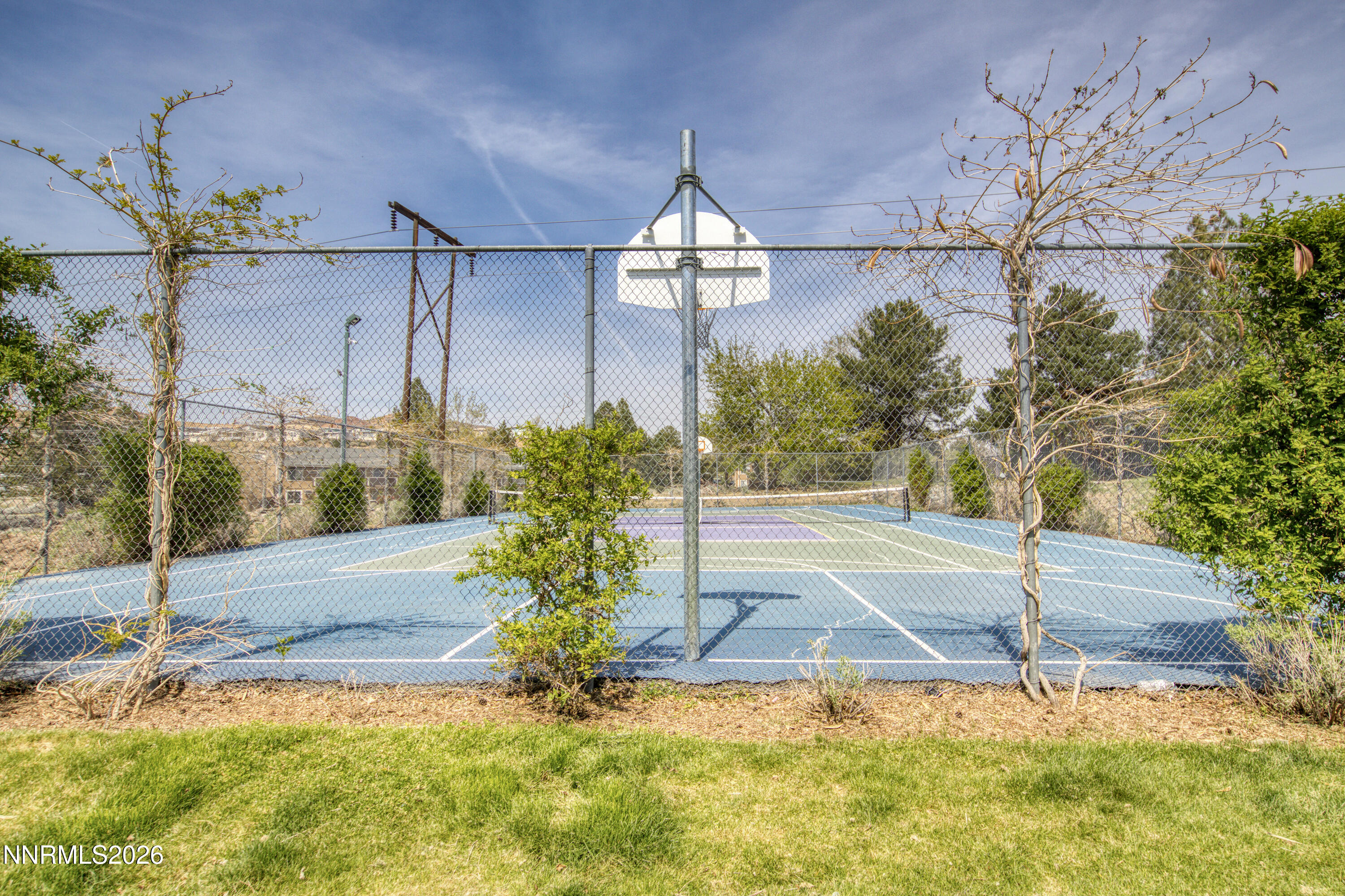 3905 Clear Acre Lane, Unit 26 Reno, NV 89512 - Photo 27 of 27 a front view of a house with a yard