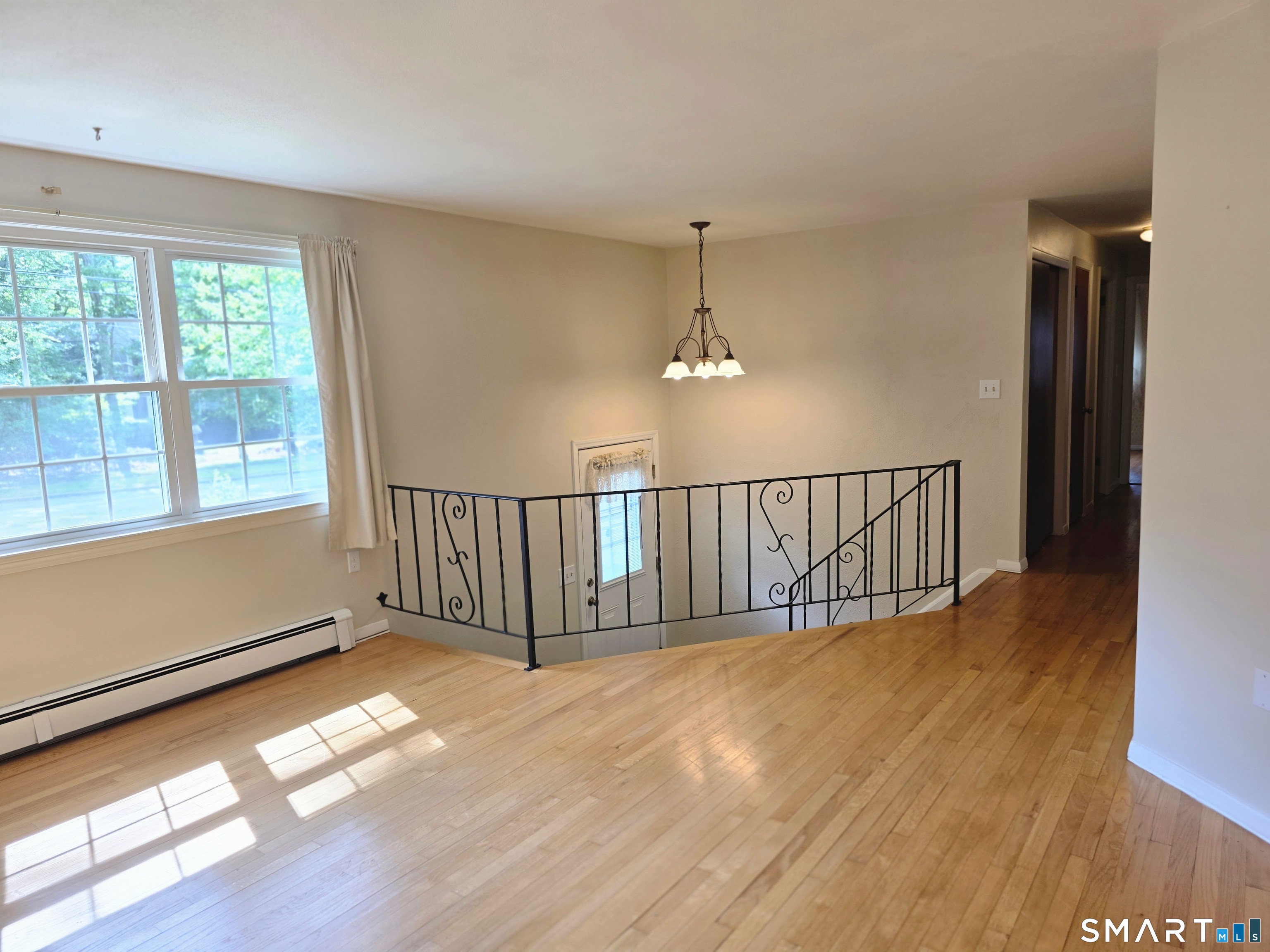 279 Gales Ferry Road Groton, CT 06340 - Photo 8 of 32 Living Room w/hardwood flooring