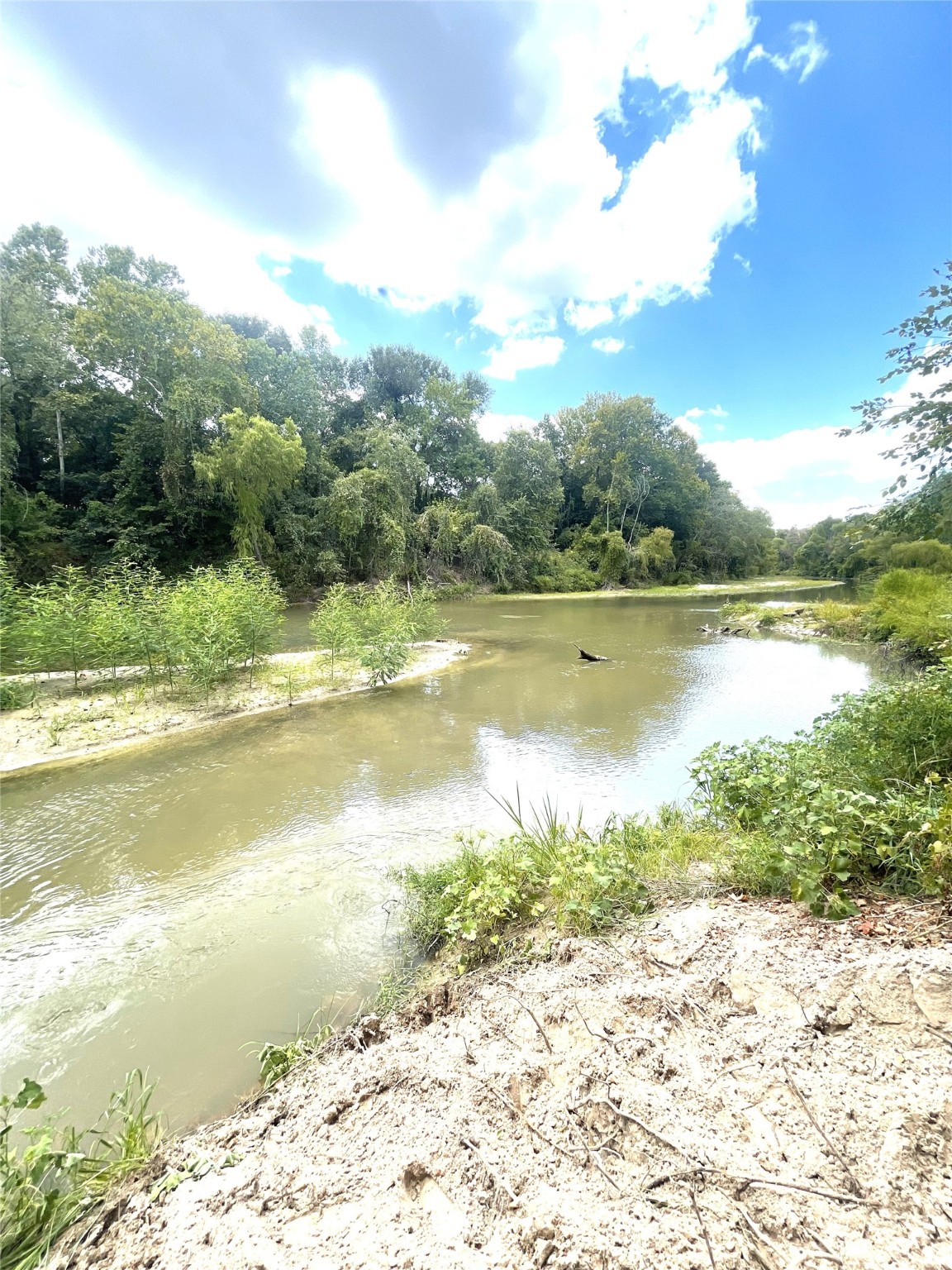 0 Redbud Drive Conroe, TX 77302 - Photo 5 of 7 a view of an ocean and beach