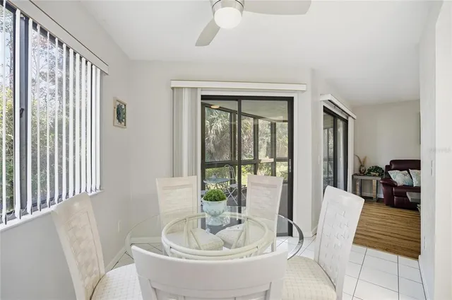 a bedroom with a large bed and a flat tv screen