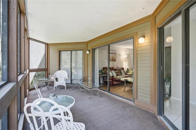 a bedroom with a bed and a mirror