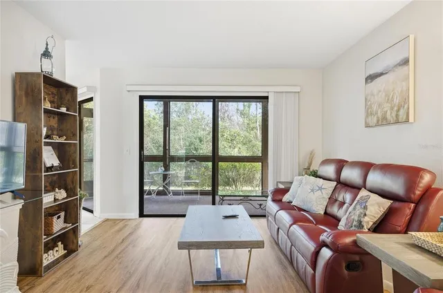 a kitchen with a stove a sink and cabinets