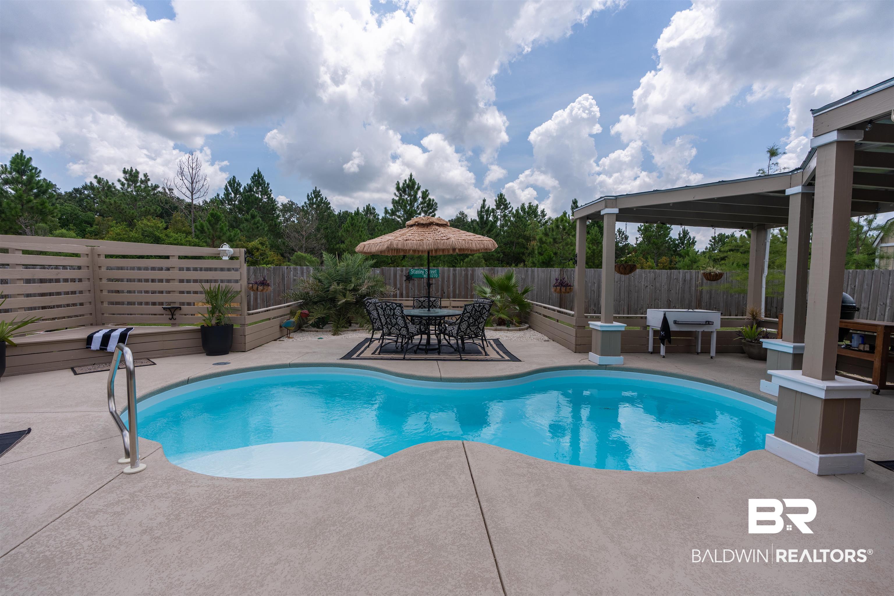3168 Bellingrath Drive Foley, AL 36535 - Photo 3 of 36 View of swimming pool with a patio