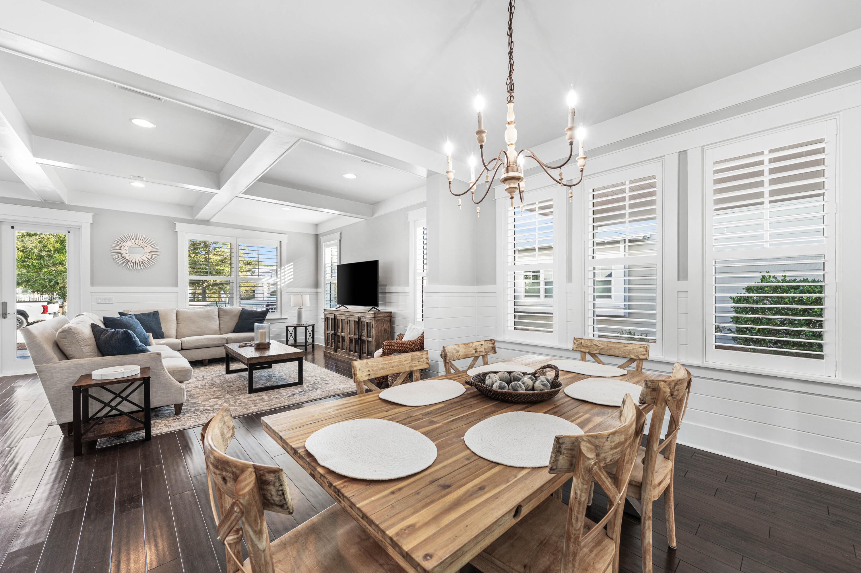 1085 Sandgrass Boulevard Santa Rosa Beach, FL 32459 - Photo 11 of 62 a view of a dining room with furniture window and wooden floor