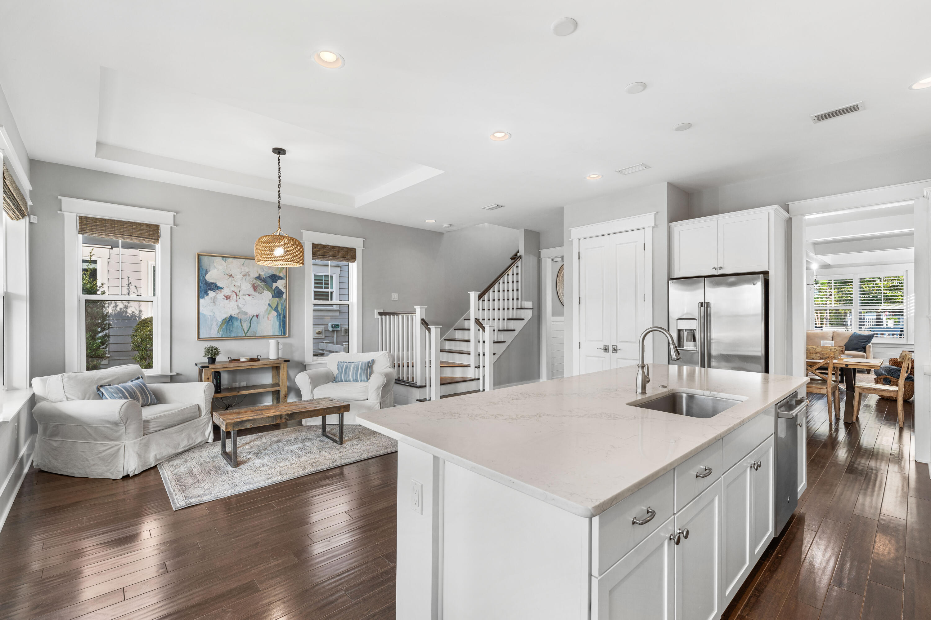 1085 Sandgrass Boulevard Santa Rosa Beach, FL 32459 - Photo 14 of 62 a kitchen with stainless steel appliances granite countertop a stove and a living room