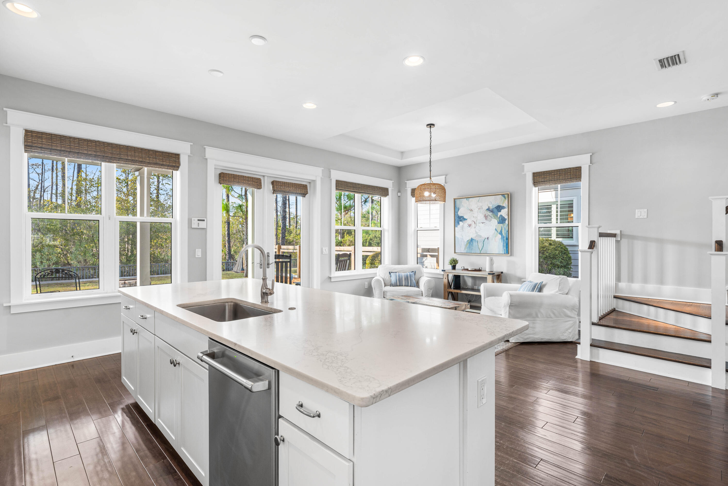 1085 Sandgrass Boulevard Santa Rosa Beach, FL 32459 - Photo 19 of 62 a very nice looking living room with a large window wooden floor and white stainless steel appliances