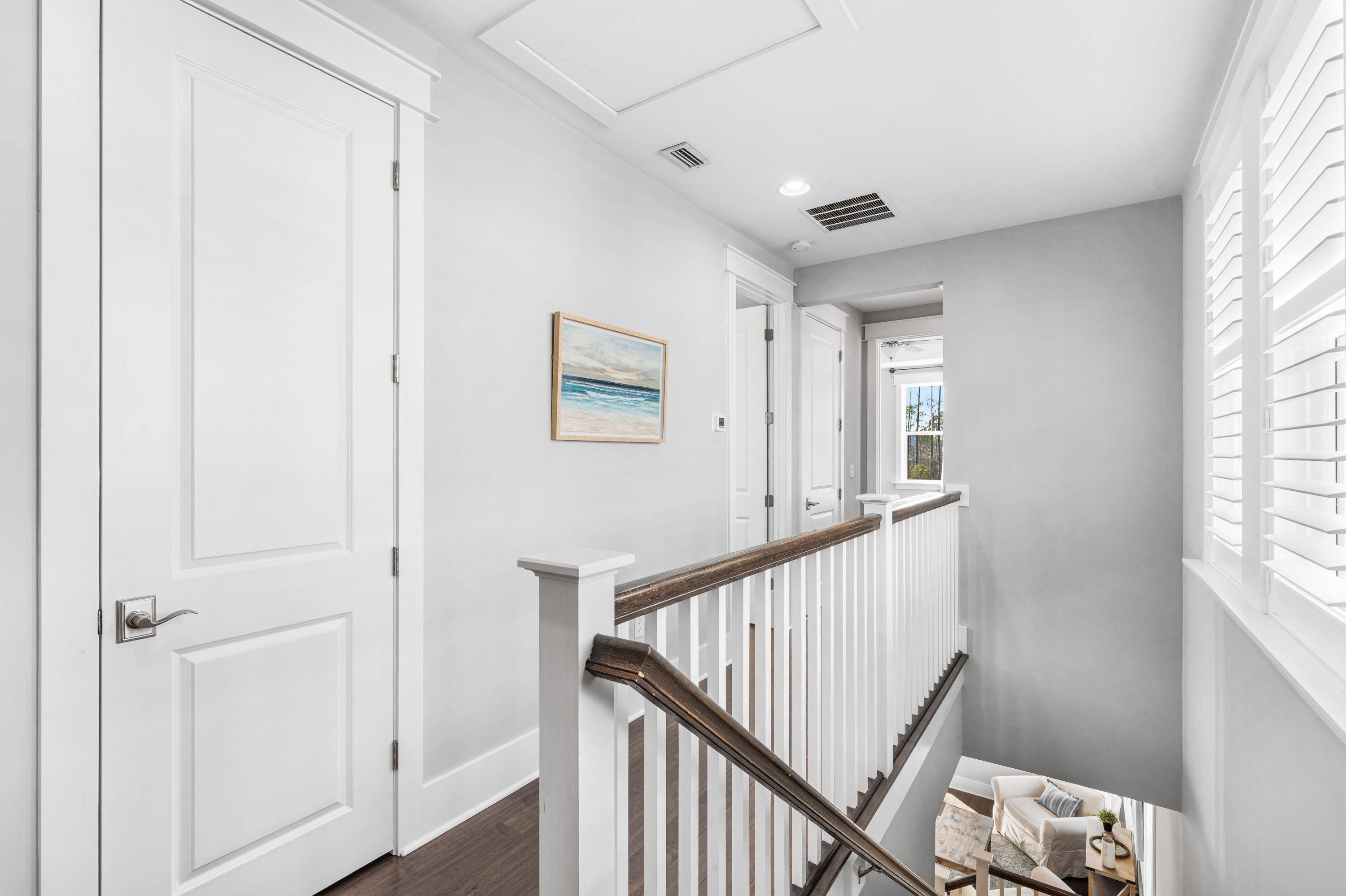 1085 Sandgrass Boulevard Santa Rosa Beach, FL 32459 - Photo 22 of 62 a view of a hallway with window and stairs