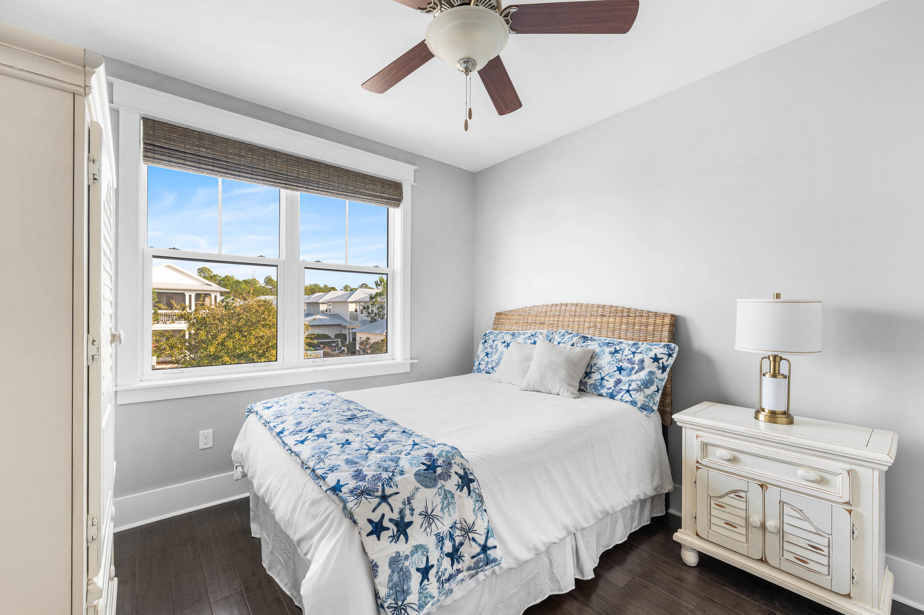 1085 Sandgrass Boulevard Santa Rosa Beach, FL 32459 - Photo 33 of 62 a bedroom with a large bed and a window