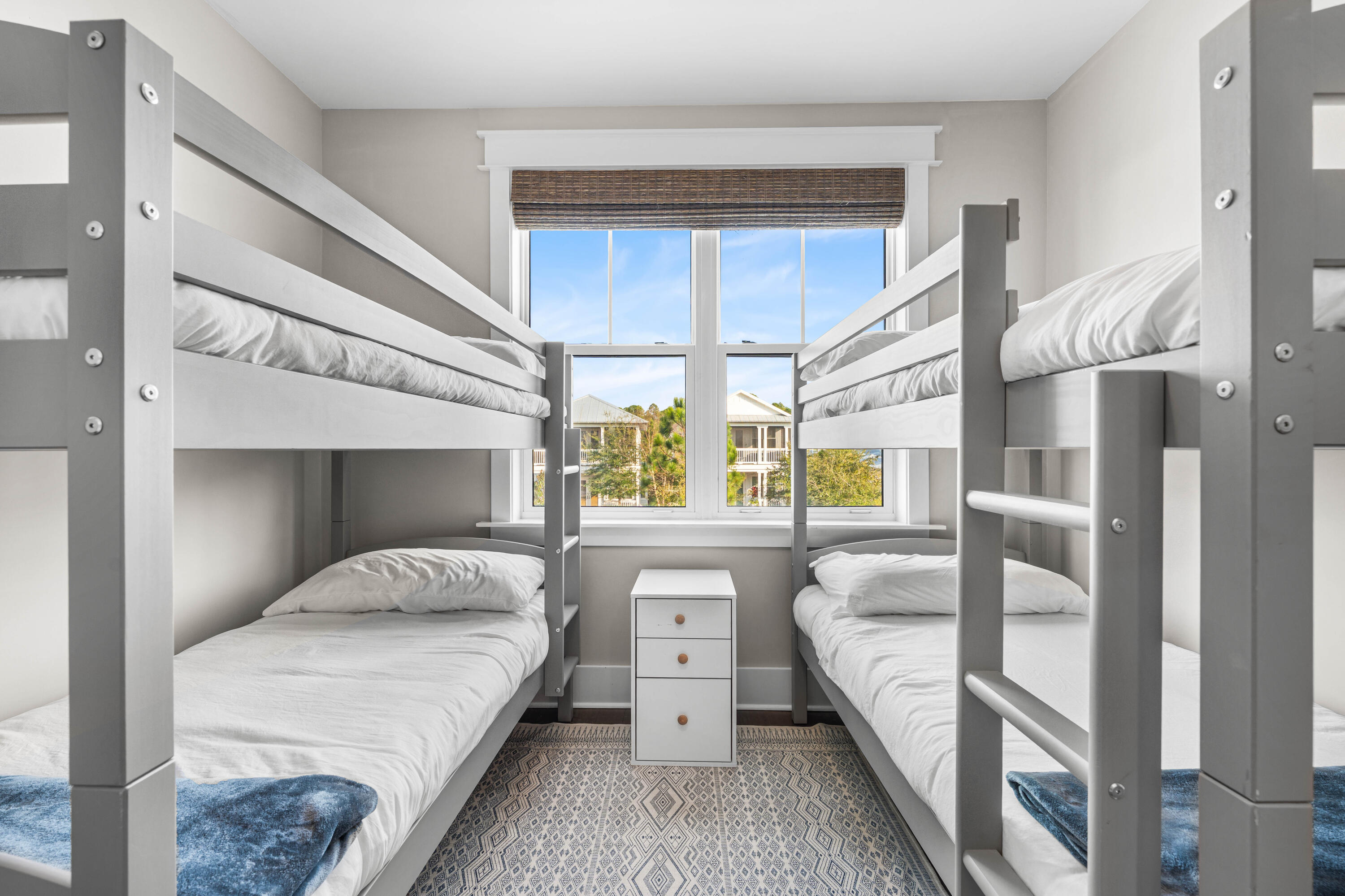 1085 Sandgrass Boulevard Santa Rosa Beach, FL 32459 - Photo 40 of 62 a bedroom with a large bed and a balcony