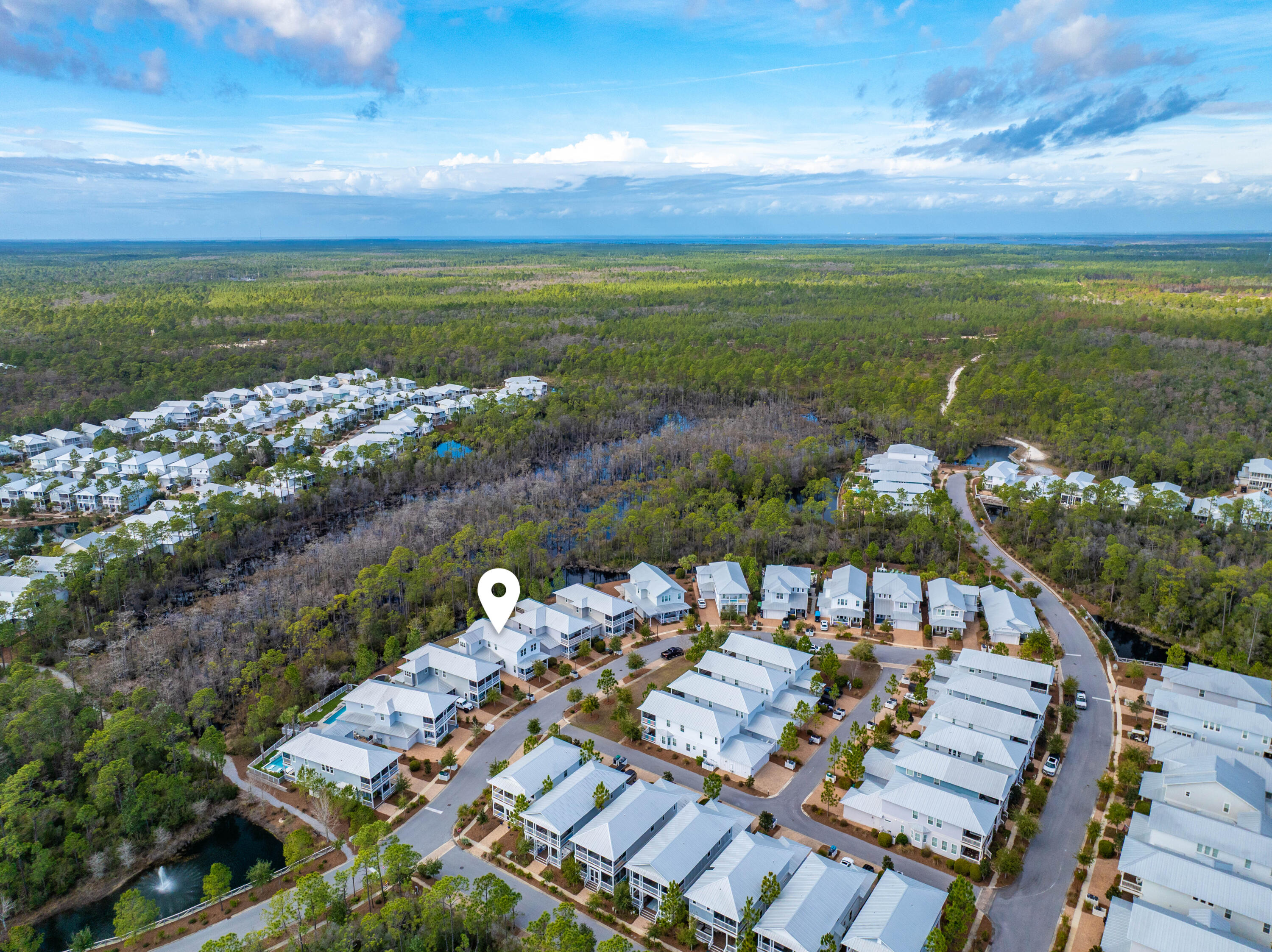 1085 Sandgrass Boulevard Santa Rosa Beach, FL 32459 - Photo 51 of 62 an aerial view of a house with a ocean view