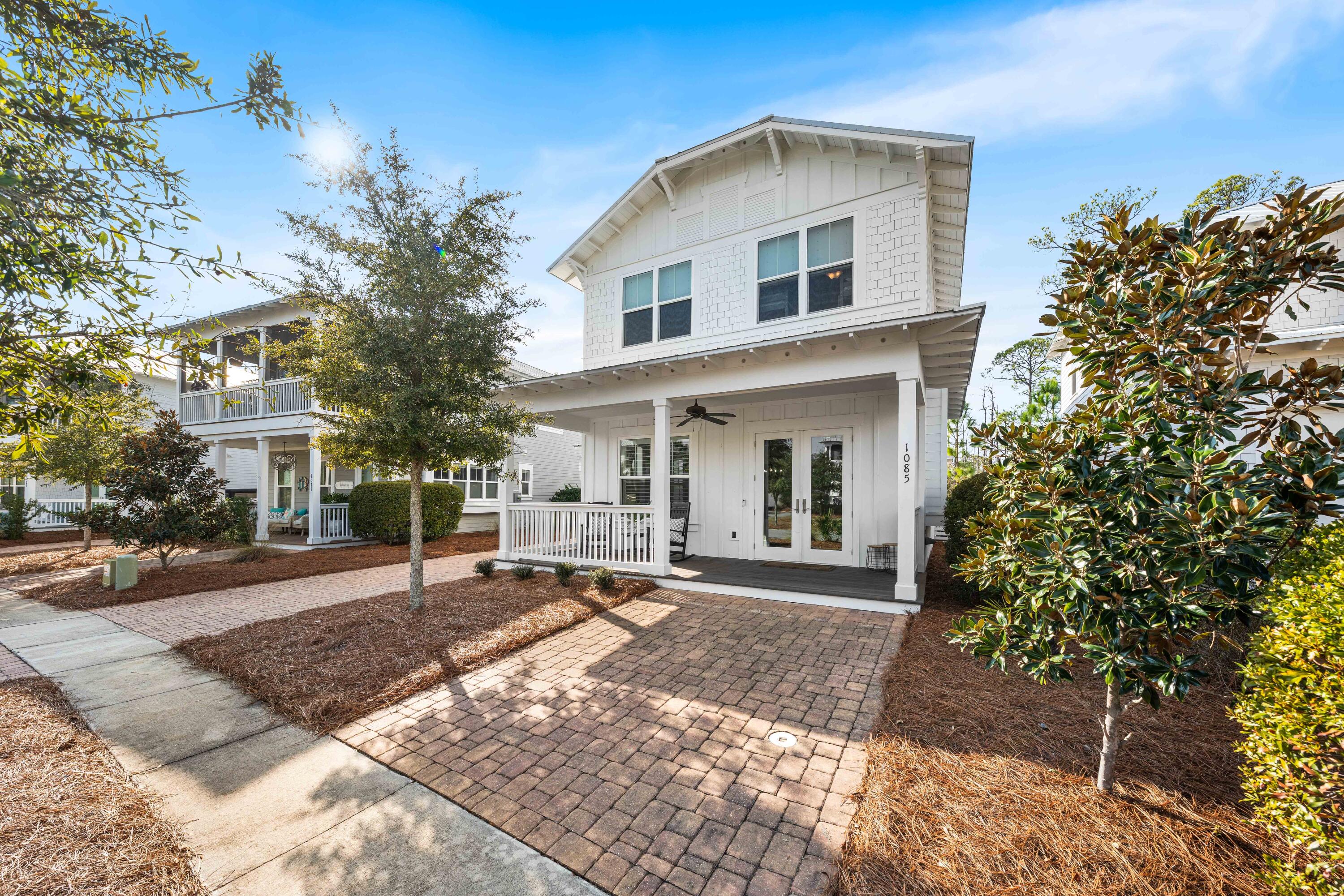 1085 Sandgrass Boulevard Santa Rosa Beach, FL 32459 - Photo 53 of 62 front view of a house with a yard