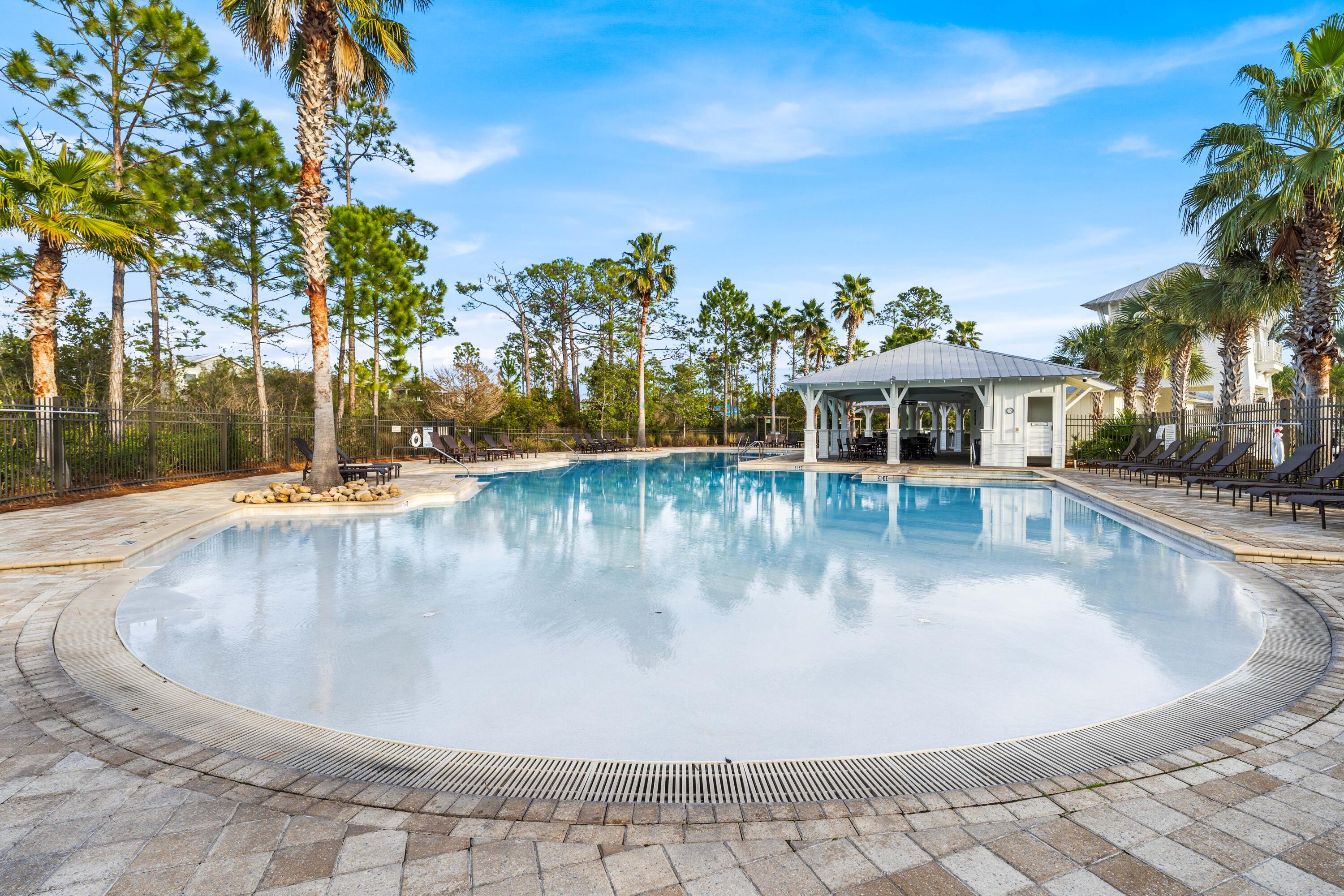 1085 Sandgrass Boulevard Santa Rosa Beach, FL 32459 - Photo 60 of 62 a view of a swimming pool with an outdoor space