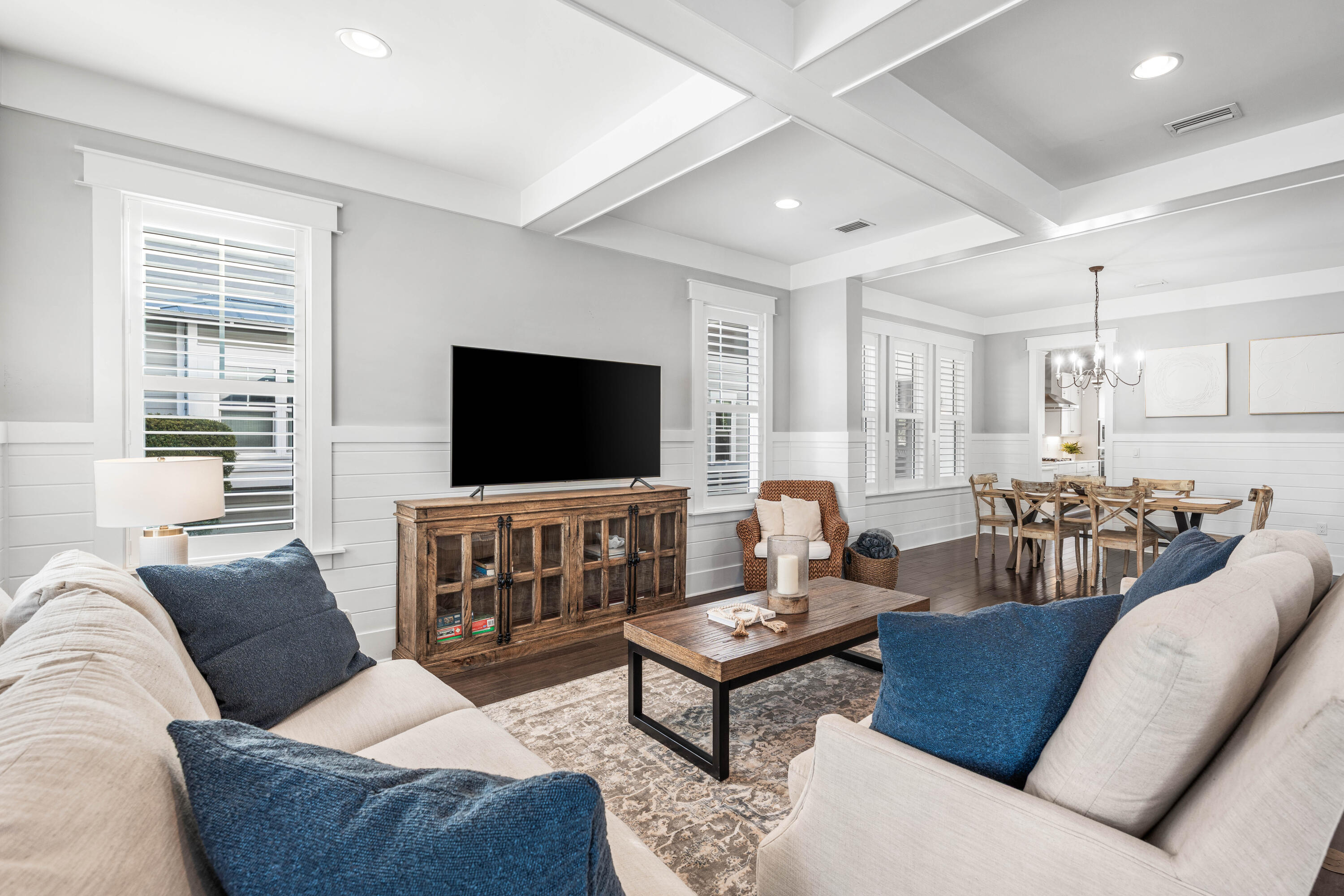 1085 Sandgrass Boulevard Santa Rosa Beach, FL 32459 - Photo 8 of 62 a living room with furniture and a flat screen tv