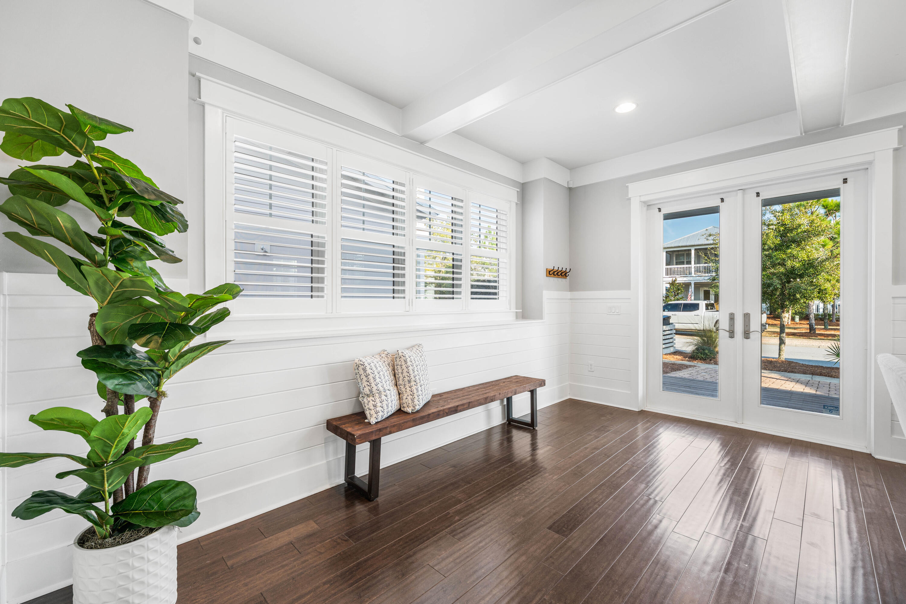 1085 Sandgrass Boulevard Santa Rosa Beach, FL 32459 - Photo 9 of 62 a living room with furniture and a potted plant