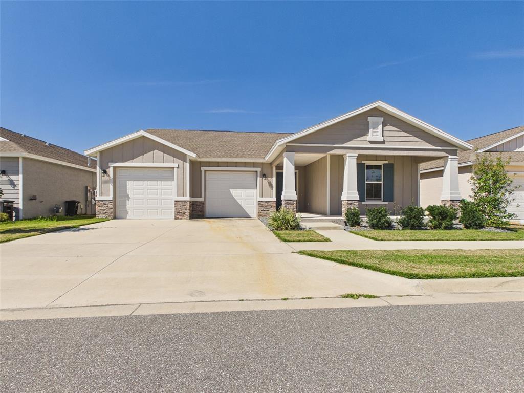 6224 Southwest 74th Ter Road Ocala, FL 34474 - Photo 1 of 52 a front view of a house with a yard