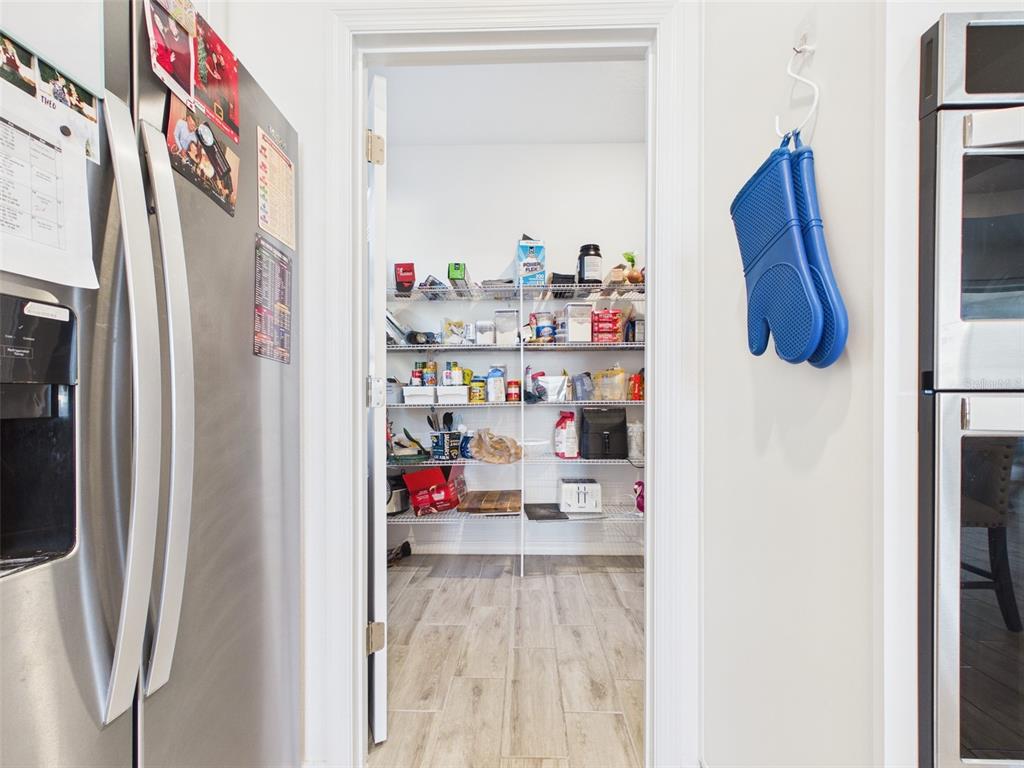 6224 Southwest 74th Ter Road Ocala, FL 34474 - Photo 18 of 52 a view of walk in closet with clothes and shoes