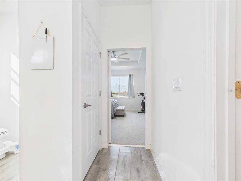 6224 Southwest 74th Ter Road Ocala, FL 34474 - Photo 26 of 52 a view of a bedroom from a hallway
